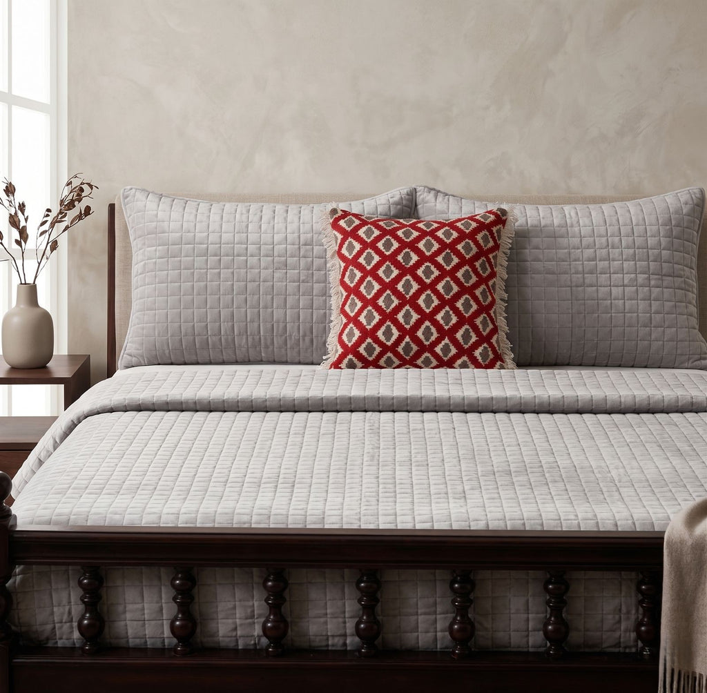 Grey velvet quilted bedspread set showing pillow covers and bed styling