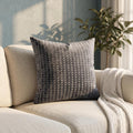 Silver dot embroidered cushion cover on deep charcoal grey velvet base