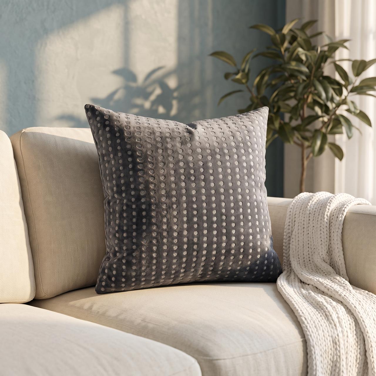 Silver dot embroidered cushion cover on deep charcoal grey velvet base