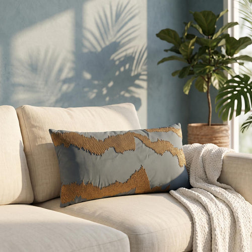 Slate blue lumbar cushion cover with gold wave bead embroidery on sofa